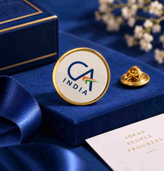 Round CA India brooch with gold finish showcased on a royal blue velvet background