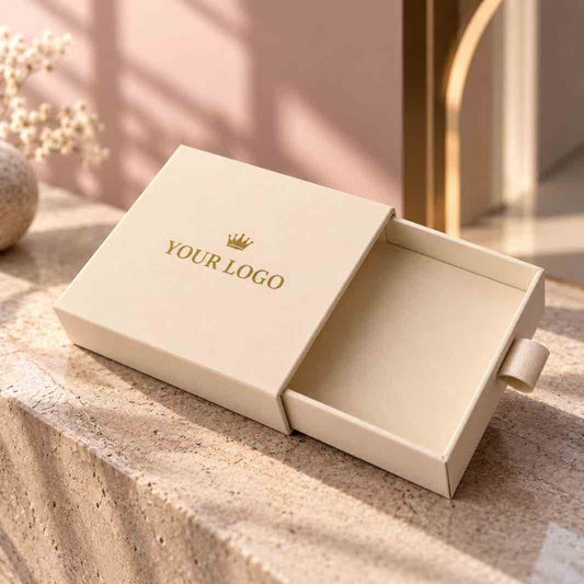 Ankx custom logo jewellery gift box with sliding drawer open on stone ledge