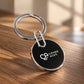 Black personalized CIPHER ACES keychain with silver metal ring showcased on a premium wooden surface