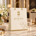Custom logo gift bag with braided rope handles and geometric foil accent