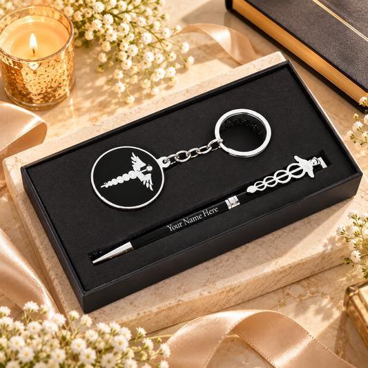 Luxury personalized medical pen and keychain gift set presented in a black box on a cream marble surface with elegant gifting décor.