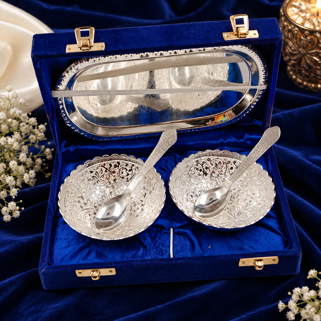 Premium engraved silver bowls and matching spoons displayed in a royal blue velvet presentation box