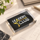 Custom acrylic paper weight with personalized logo design displayed on a premium office desk