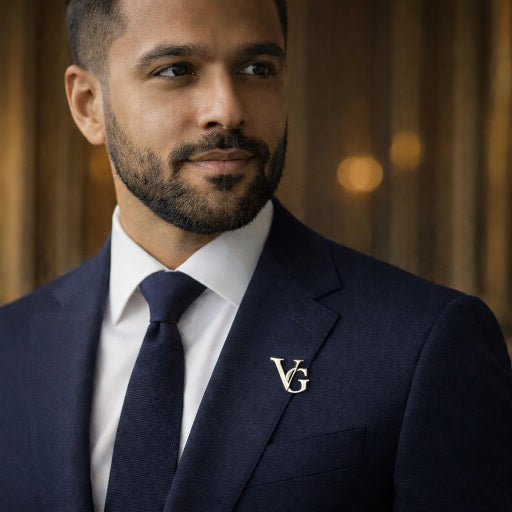 Silver initial letter lapel brooch on navy suit for corporate bulk gifting India by ANKX Bulk